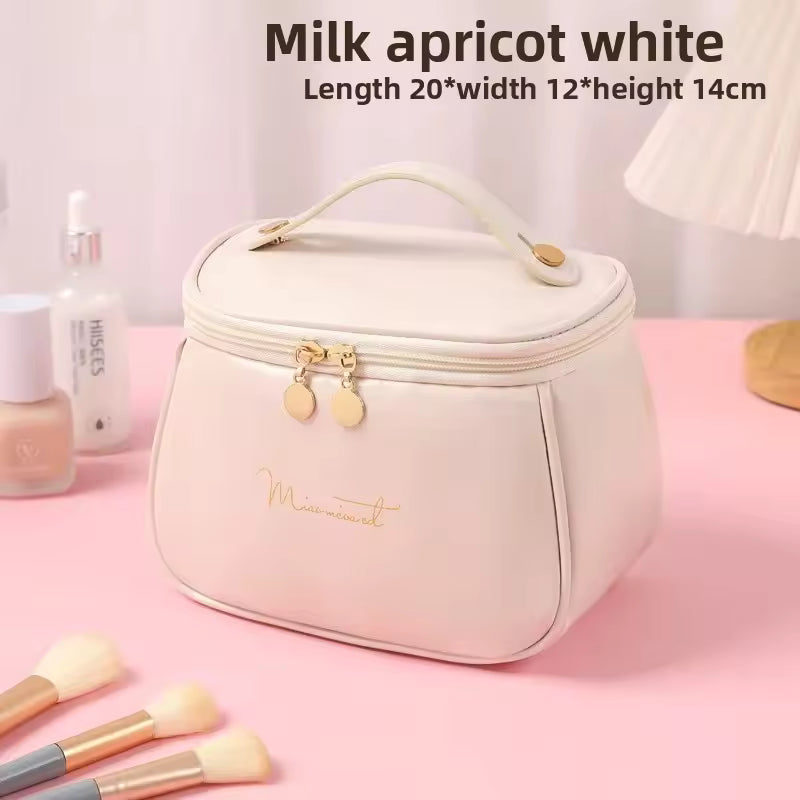 Milk apricot white PU leather handheld makeup wash bag with gold zipper and handle