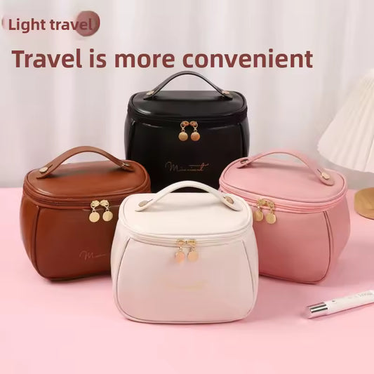 PU leather handheld makeup wash bag in black white brown and pink with top handle by Clarify.pk
