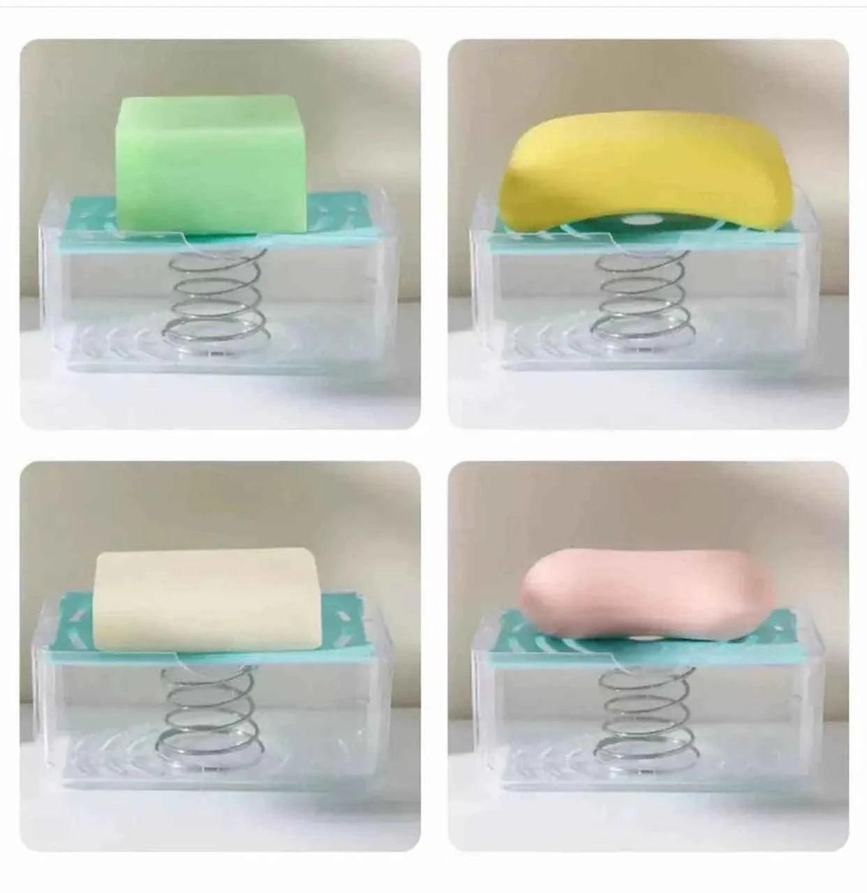 Clarify.pk hands-free soap dispenser with spring base holding different colored soap bars