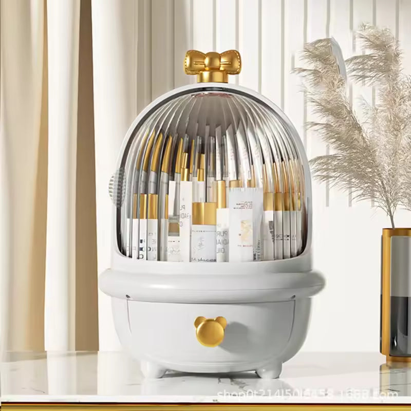Clarify.pk high capacity cosmetic storage box with transparent dome and gold accents holding makeup brushes and products