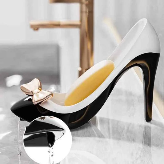 Stylish high heel soap dish in black and white with a bow accent for elegant bathroom decor