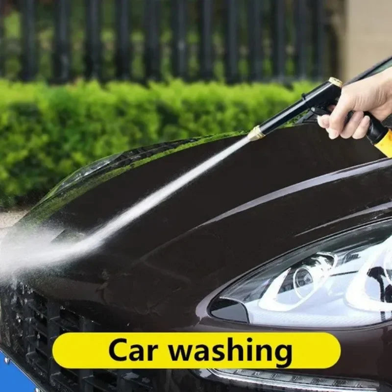Clarify.pk high pressure water gun spraying water to wash a black car hood