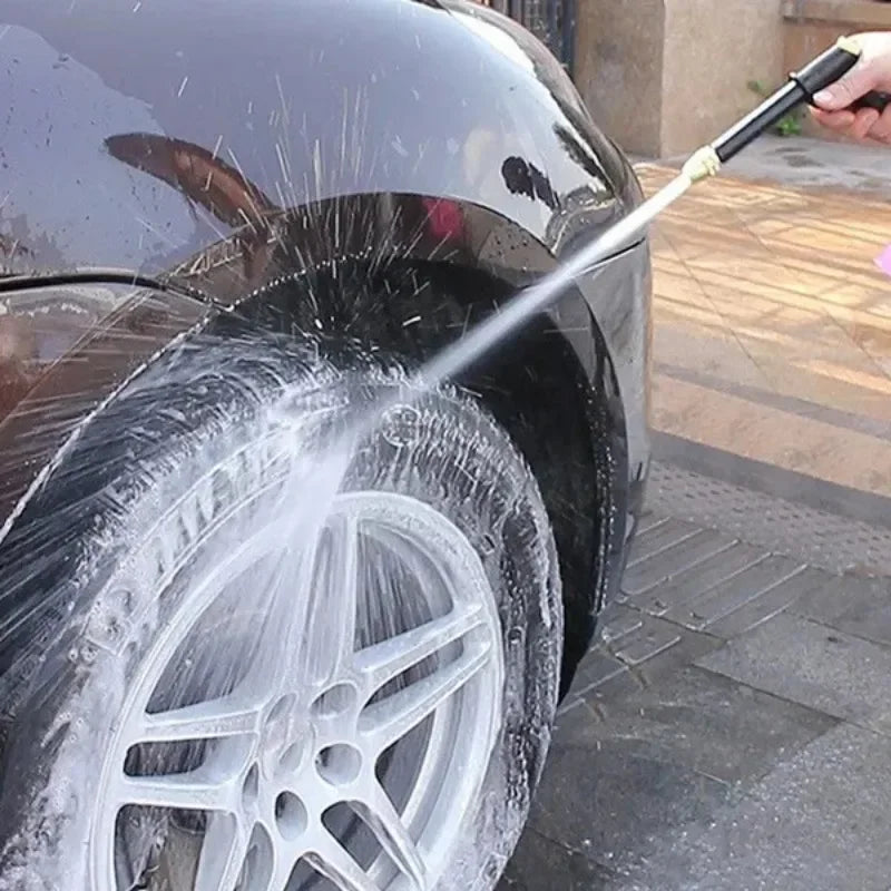 Clarify.pk high pressure water gun cleaning a car tire with strong water spray
