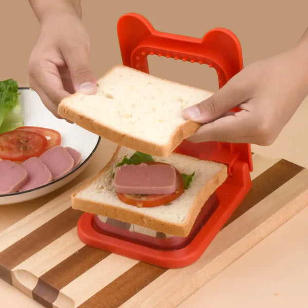 Clarify pk red sandwich cutter and sealer with hands pressing bread to seal and shape sandwich