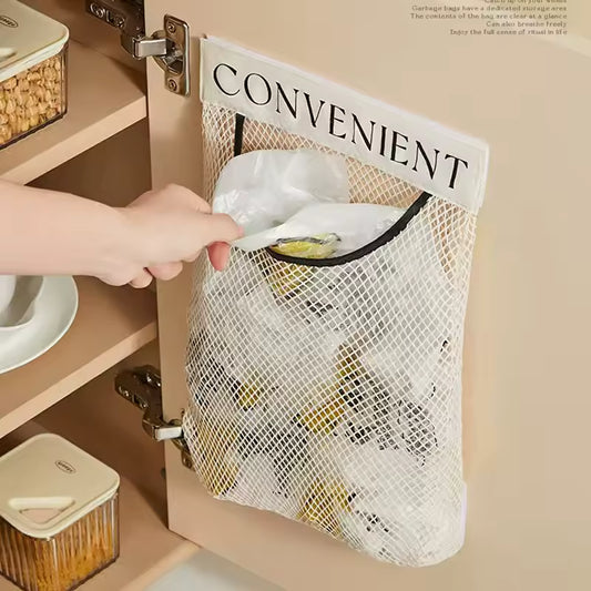 Clarify pk mesh hanging cabinet bag labeled CONVENIENT with hand pulling a plastic sack garbage bag dispenser organizer