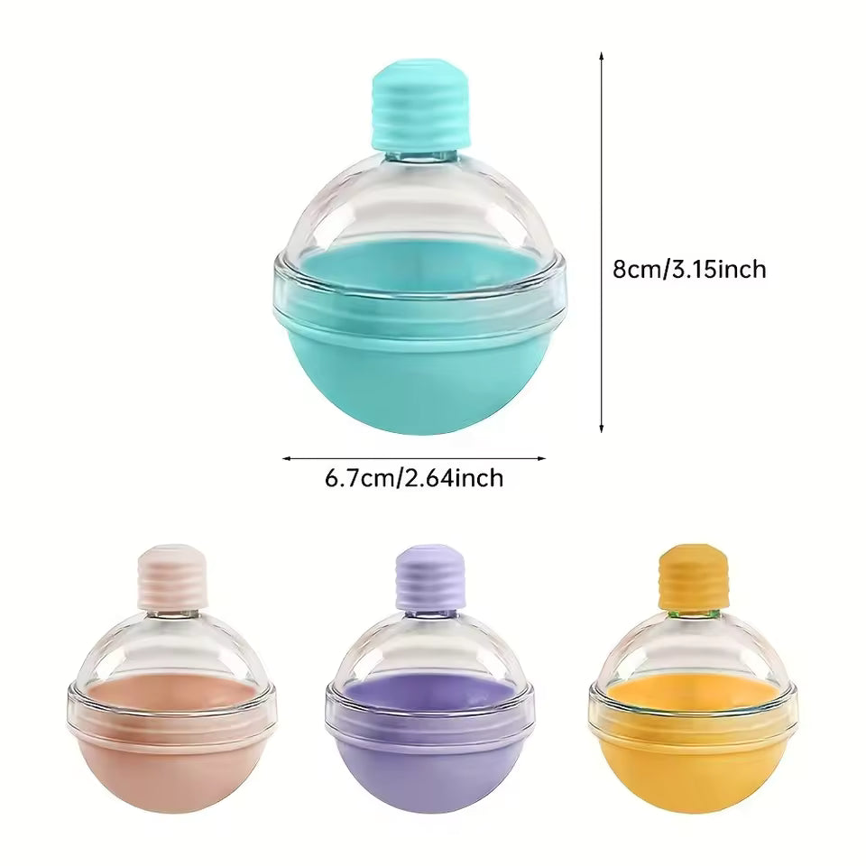 Colorful spherical ice molds in blue, pink, purple, and yellow for ice cream makers by Clarify pk