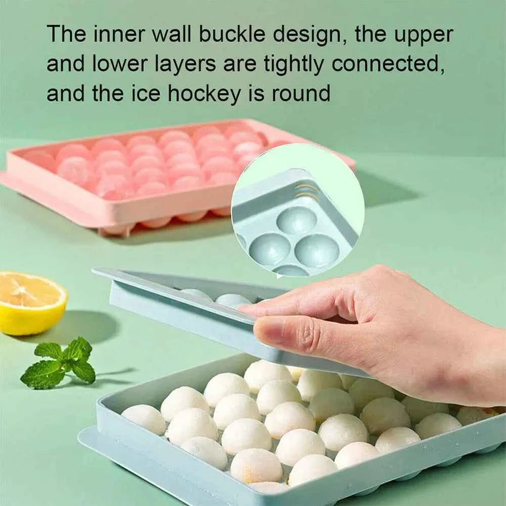 Round ice cube tray with multiple compartments for creating perfectly round ice cubes