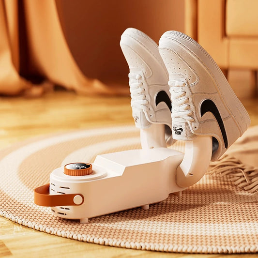 Clarify.pk Intelligent Timer Shoe Dryer in white with adjustable timer and carrying handle drying white sneakers