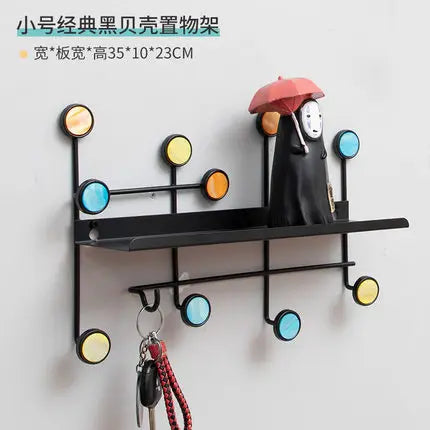Iron art key holder for home with colorful round hooks and decorative figure holding red umbrella
