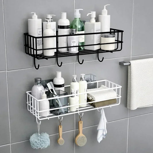 Black and white Japanese style bathroom rack mounted on wall holding toiletries and hanging brushes