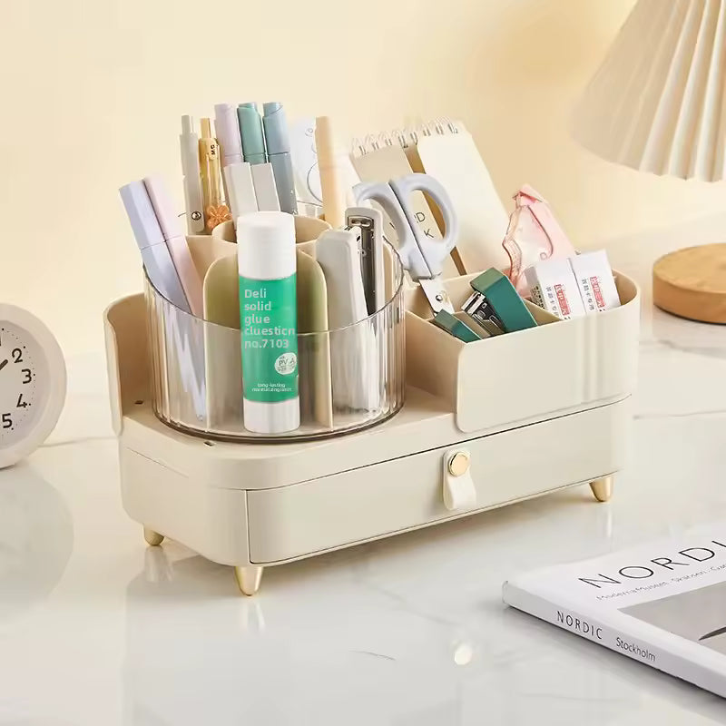 Beige jewelry and makeup organizer box with compartments holding scissors, pens, glue stick, and small accessories