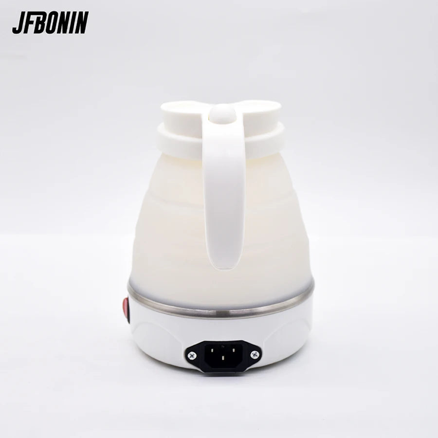 White 600ml foldable electric kettle with handle and plug socket base for water heating