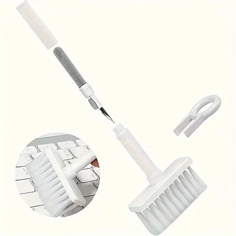White keyboard cleaning brush kit with multiple tools for removing dust and debris from keyboards