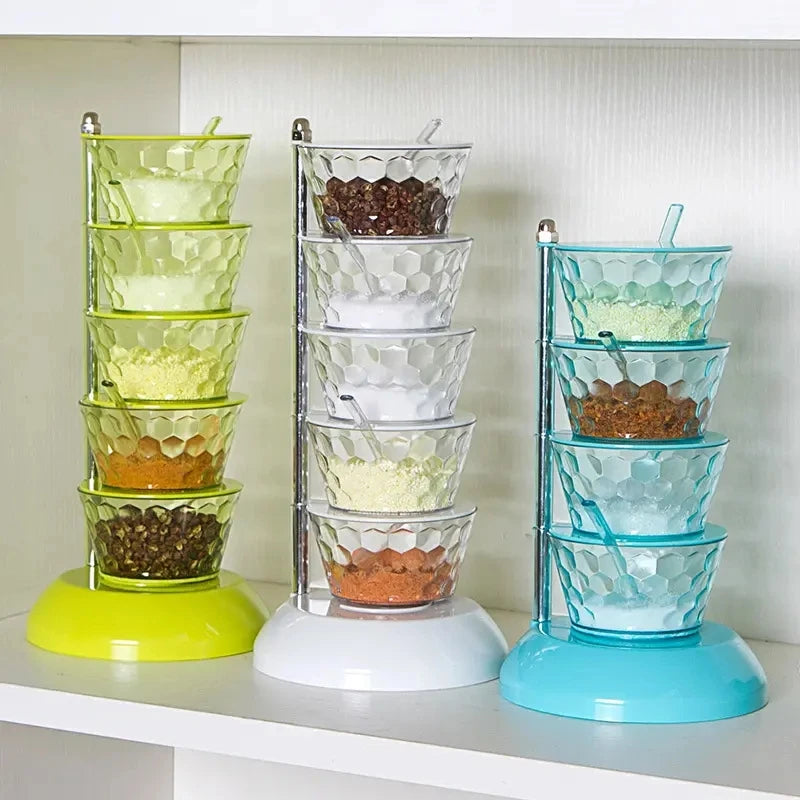 Clarify.pk 5 layer spice organizer with colorful 5-tier spice and pepper shakers on kitchen shelf