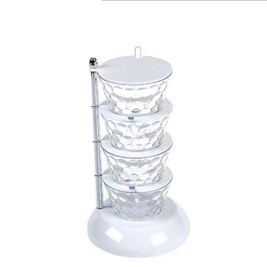 Clarify.pk 5 layer spice organizer with clear glass containers and silver lids on a rotating stand