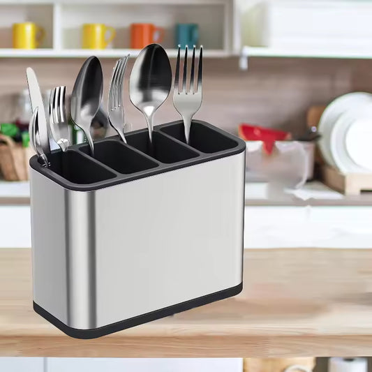 Stainless steel kitchen cutlery organizer holding forks and spoons on kitchen counter