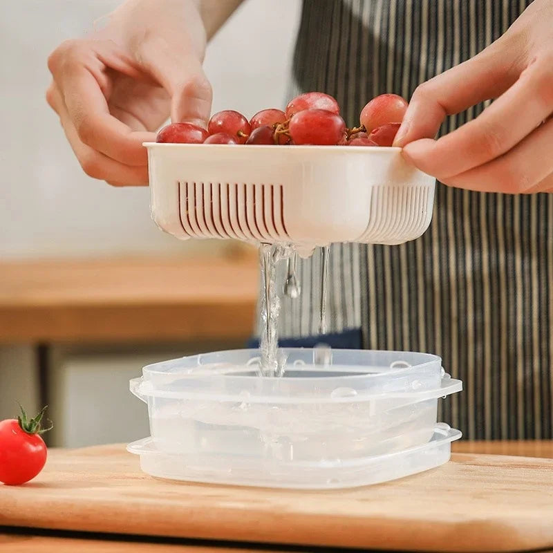Clear kitchen food storage containers with drain feature for washing fruits and vegetables