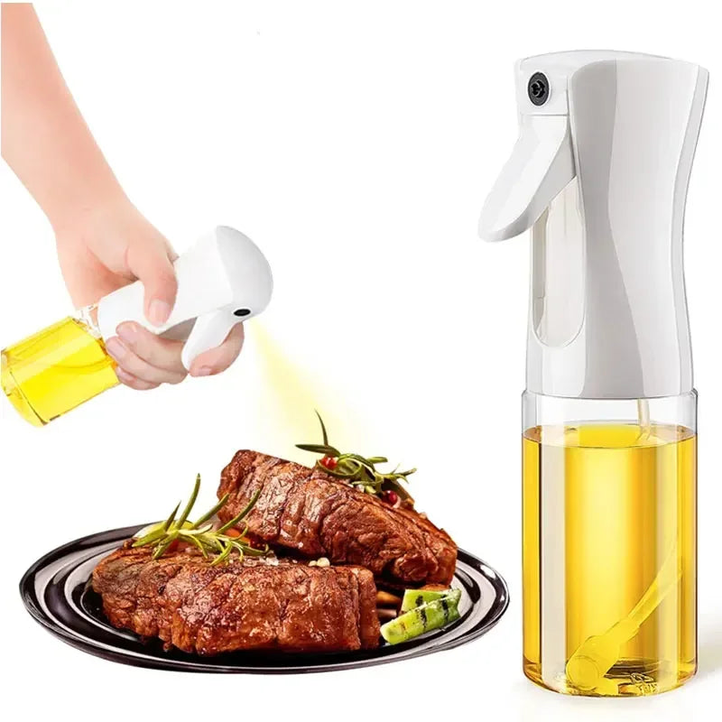 Clarify.pk kitchen oil spray bottle dispensing oil onto grilled steak on a black plate