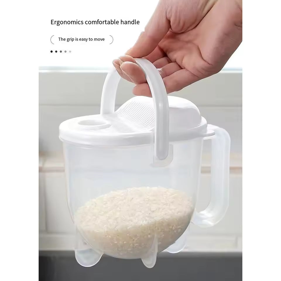 Clear plastic rice strainer with handle and ergonomic grip being held over a sink filled with rice