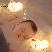 Soft silicone Cat LED lamp glowing softly near a sleeping baby for a soothing night light