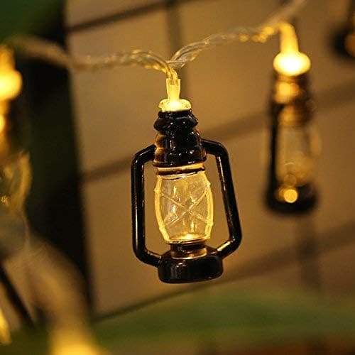Decorative lantern string lights set with warm glowing mini lantern-shaped bulbs for cozy ambiance