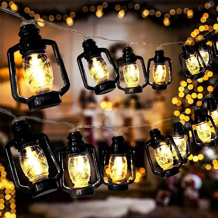 Clarify.pk lantern string lights set with warm glowing vintage-style lantern bulbs for cozy indoor decor