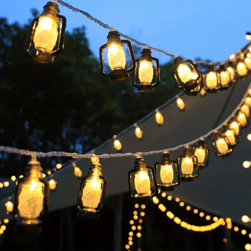 Clarify.pk lantern string lights set featuring warm glowing lantern-shaped bulbs for outdoor decoration