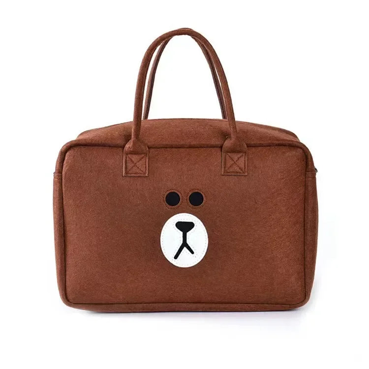 Brown large capacity cartoon travel bag with bear face design and dual handles for easy carrying
