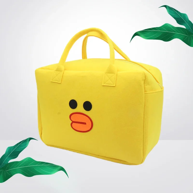 Yellow large capacity cartoon travel bag with duck face design and top handles by Clarify.pk