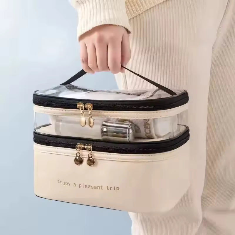 Hand holding Clarify.pk large capacity makeup organizer with transparent top and beige bottom