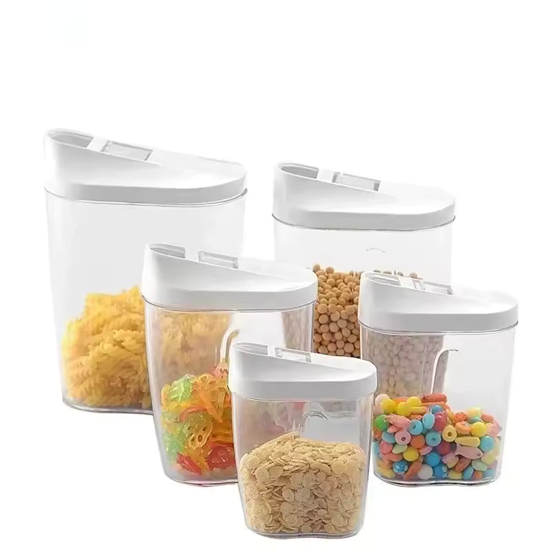 Set of large capacity storage jars for pantry with white lids holding pasta, cereals, and snacks