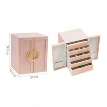 Large faux leather jewelry box in soft pink with multiple drawers and compartments for organizing accessories
