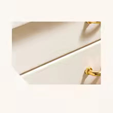 Close-up of white large faux leather jewelry box with gold handles from Clarify.pk