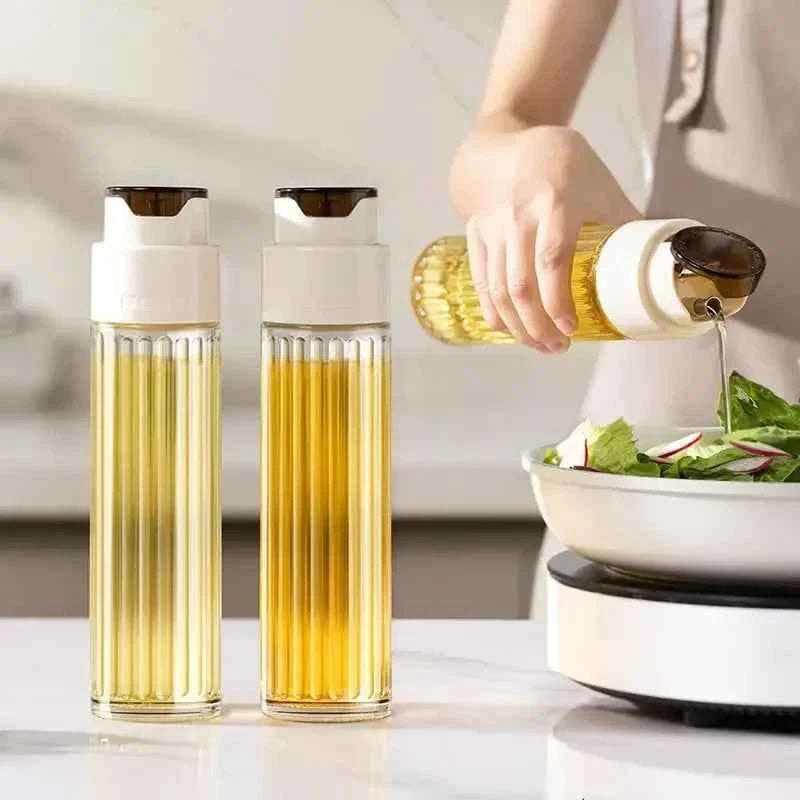Set of two leak-proof glass oil jars designed for easy pouring and stylish kitchen use