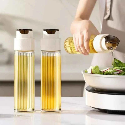 Set of two leak-proof glass oil jars designed for easy pouring and stylish kitchen use