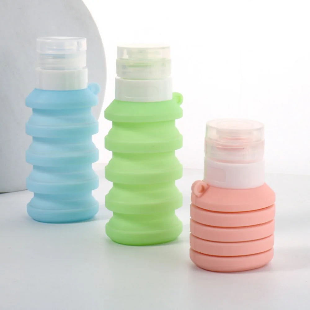Set of blue green and pink leakproof refillable shampoo bottle with flexible silicone design