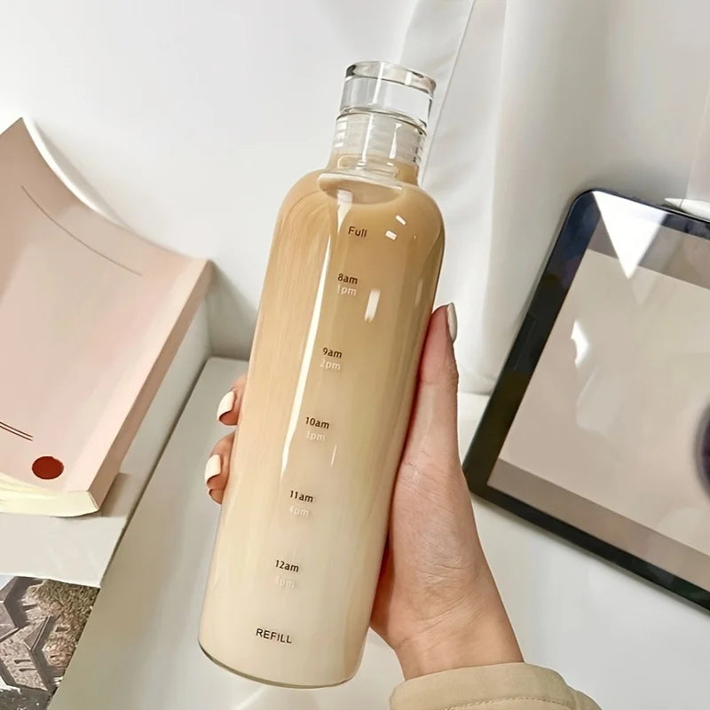 Clarify.pk leakproof sport water bottle with time markers in beige gradient held in hand