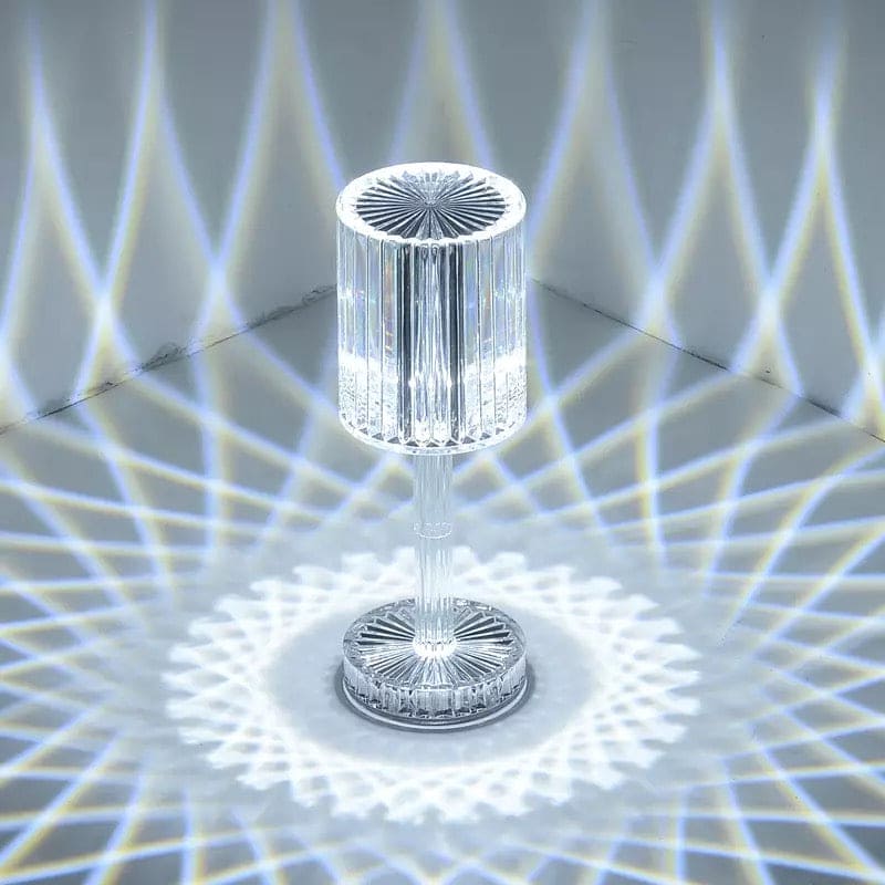 Elegant led crystal projection lamp casting intricate light patterns on walls and floor