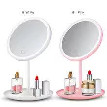 White and pink led makeup mirror with light featuring round design and storage tray for cosmetics