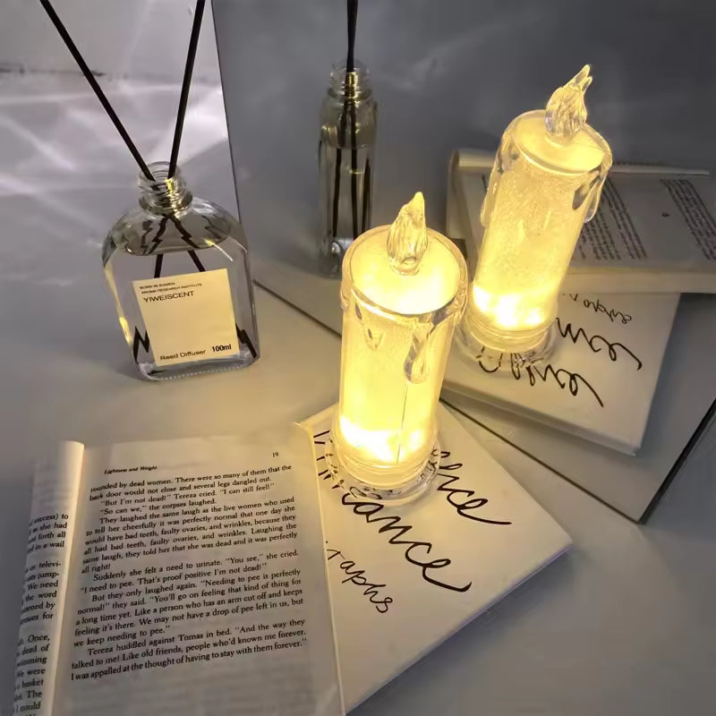 Clarify.pk LED pillar candle light illuminating a cozy reading nook with open book and diffuser