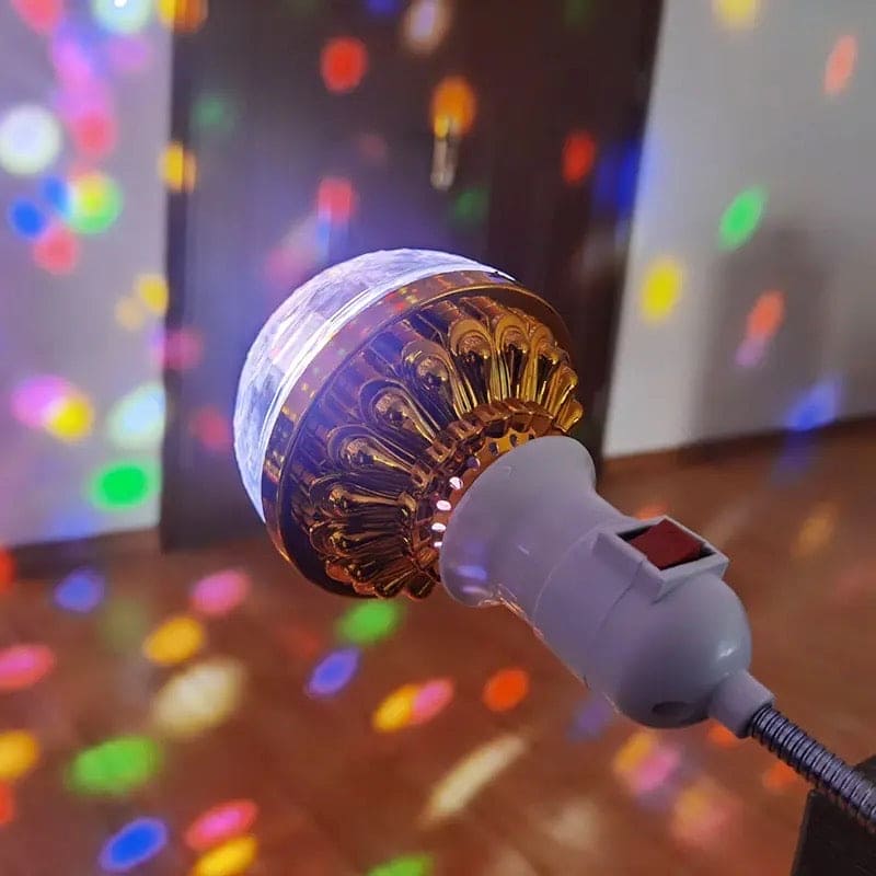 LED rotating disco ball light with colorful light spots projecting on walls and floor