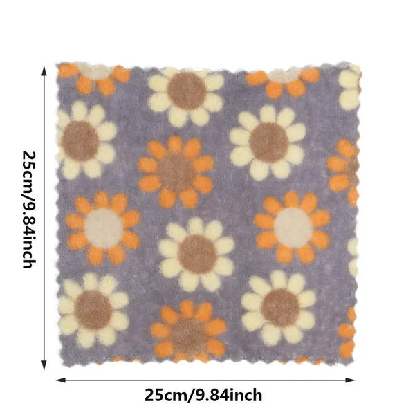 25cm square floral cotton face towels with purple background and orange cream daisy print for gentle facial use