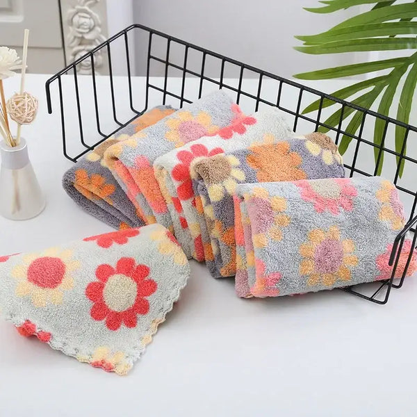 floral cotton face towels set with pastel daisy pattern folded in wire tray soft absorbent bathroom towels for everyday use