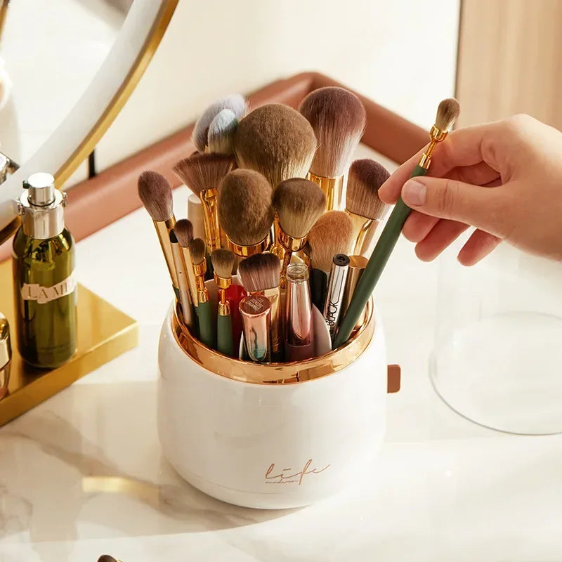 Clarify.pk 360 degree rotating makeup organizer holding various brushes and cosmetics on vanity