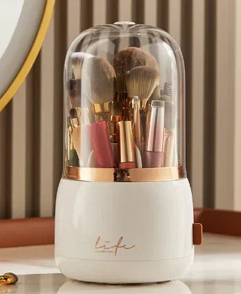 Clarify.pk 360 degree rotating makeup organizer with transparent cover and white base holding brushes and cosmetics