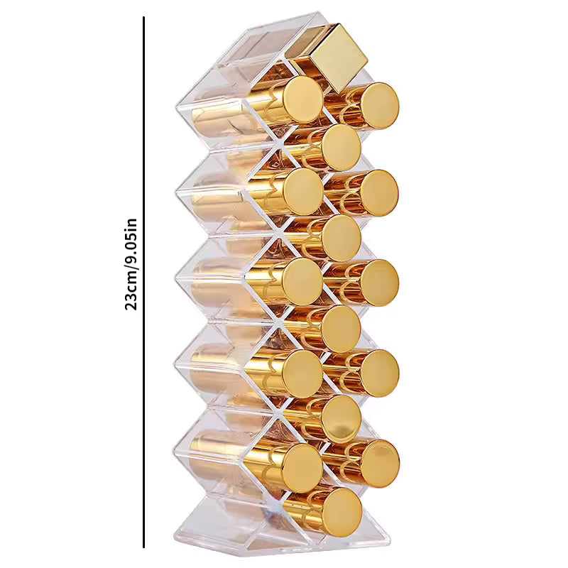 Clear lipstick organizer with compartments holding gold lipstick tubes vertically