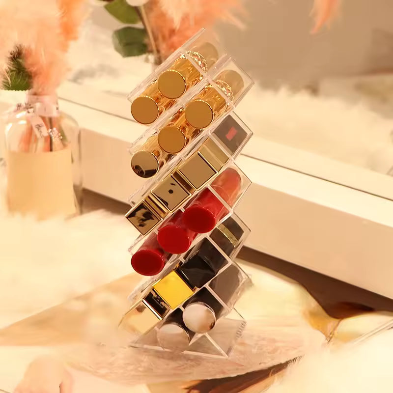 Clear lipstick organizer with compartments holding multiple lipsticks in a zigzag makeup brush storage holder