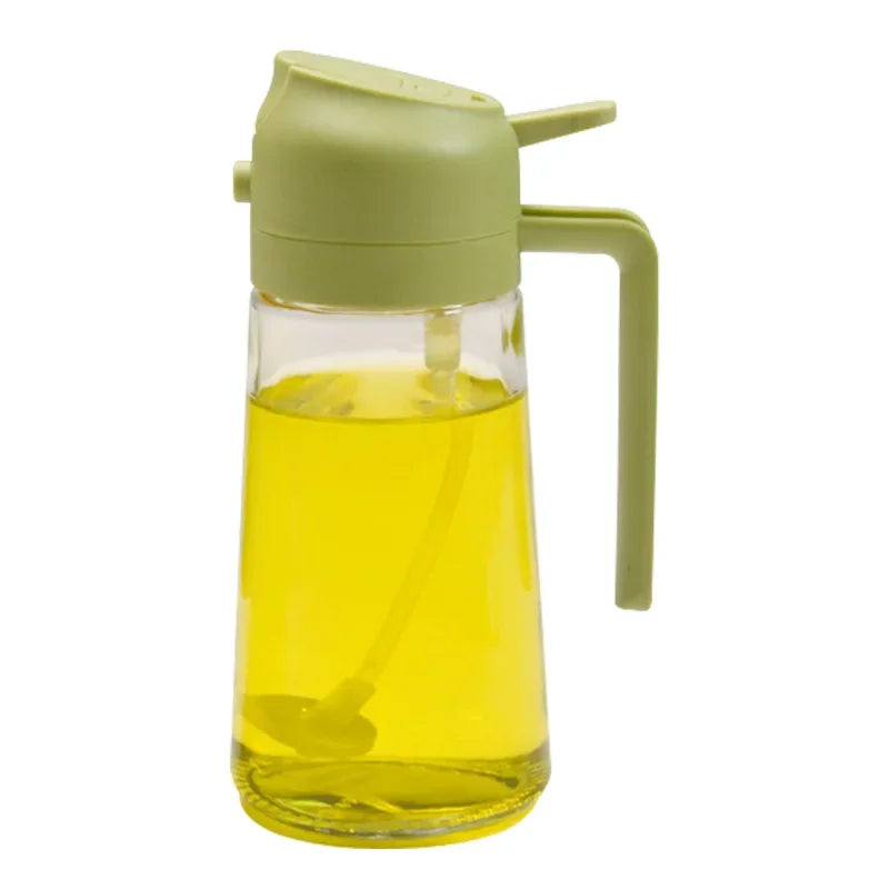 Clarify.pk 2 in 1 leakproof oil dispenser bottle with green lid and handle filled with yellow oil