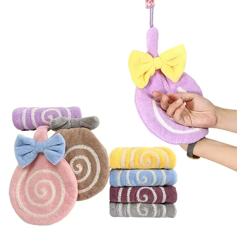 Colorful lollipop design bathroom towel with bow in purple yellow pink brown and stacked towels