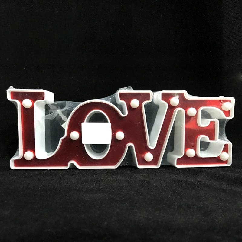 Love marquee lights for bedroom with white bulbs and red letters on black background